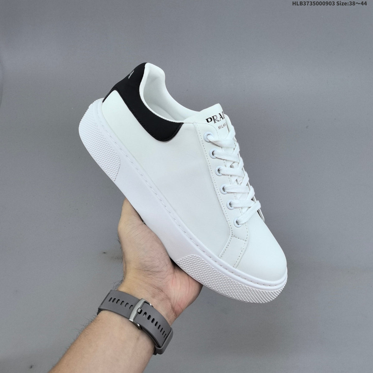 Prada Cloudbust Thunder Low-Top Sneakers, in White and Black - product image from the listing.