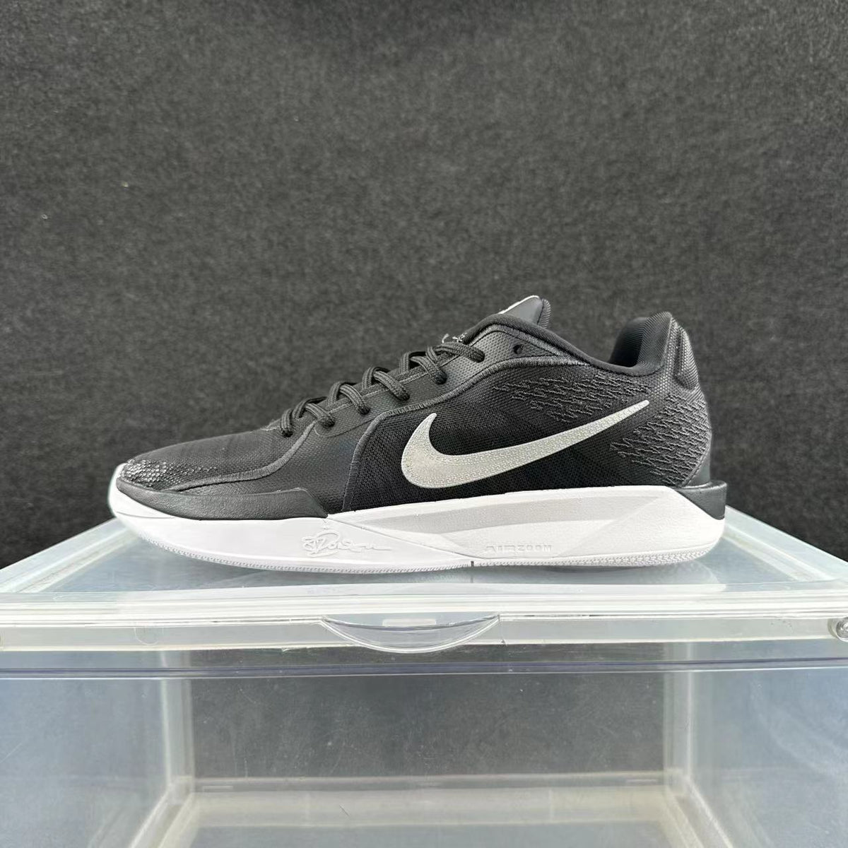 Nike Basketball Sneakers in Black and White - product image from the listing.