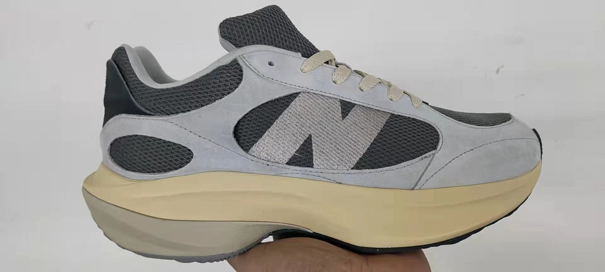 New Balance 9060 Grey Mesh Trainers - product image from the listing.