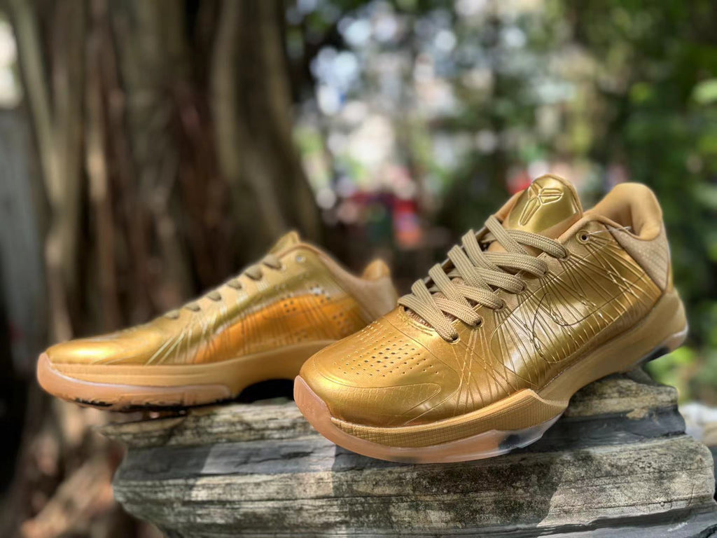 Metallic Gold Nike Kobe 5 Basketball Shoes - product image from the listing.
