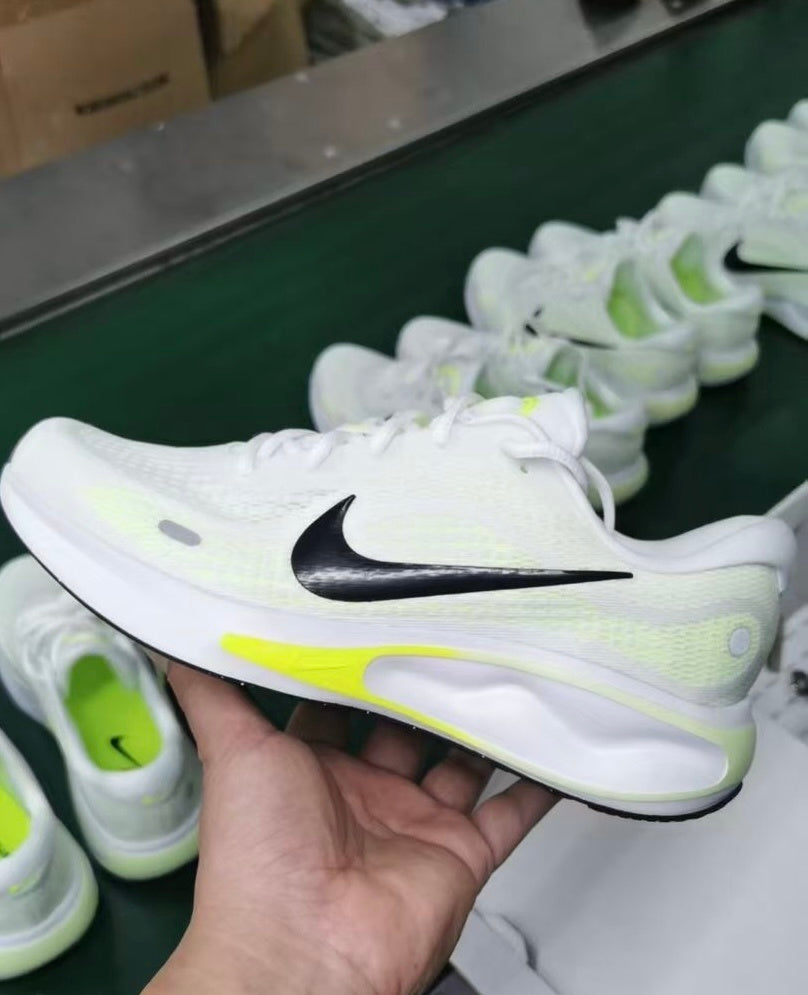 Nike Journey Run Road Running Shoes in White Volt FN0228-700 - product image from the listing.