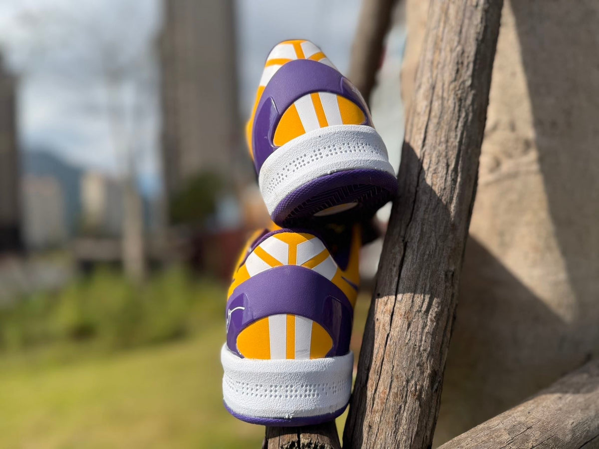 Gold and Purple Nike Kobe 8 LSU Basketball Shoes - product image from the listing.