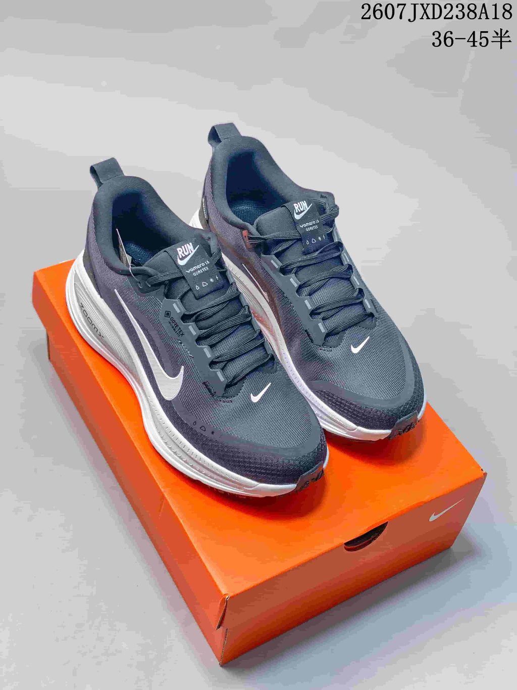 Nike Vomero 18 GTX Running Shoes in Dark Gray White - product image from the listing.