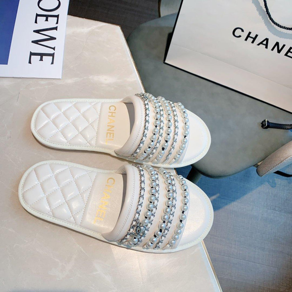 Sandals by Chanel - product photo shown in the listing for this item.