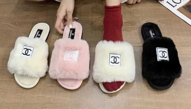 Fury Slides by Chanel - product photo shown in the listing for this item.