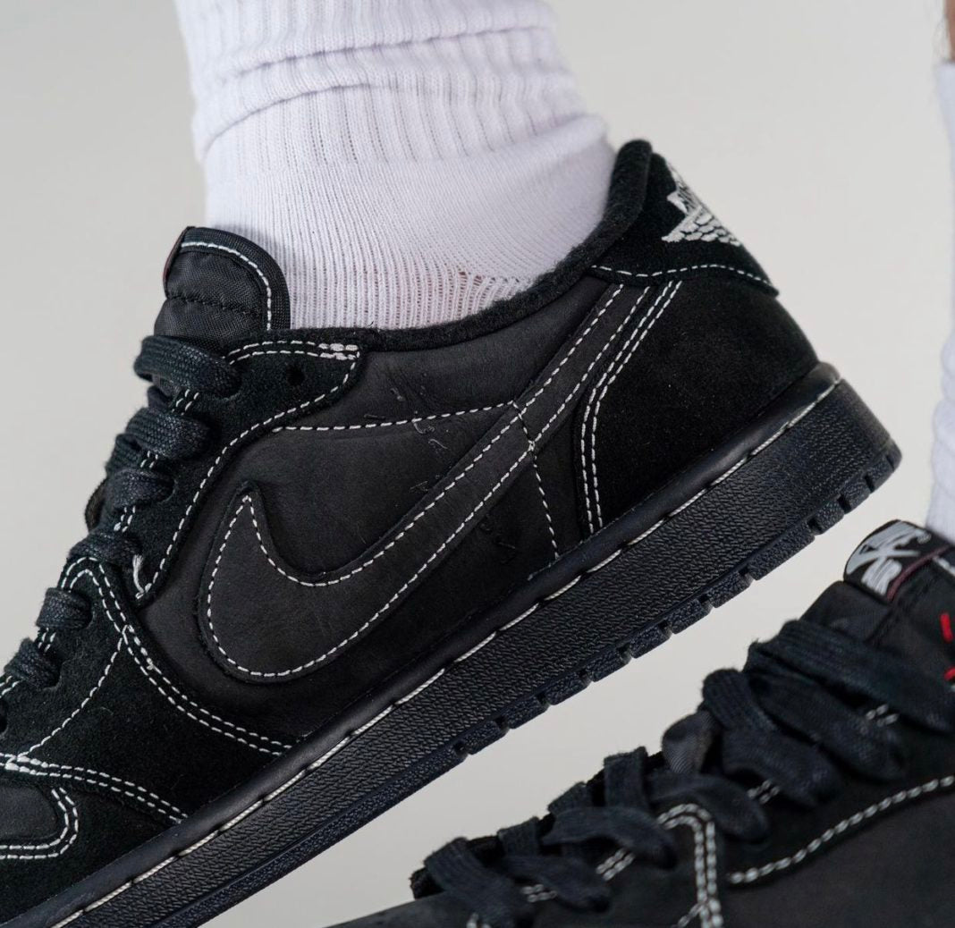 Jordan 1 Low OG Travis Scott Sneakers in Black DM7866-001 - product image from the listing.