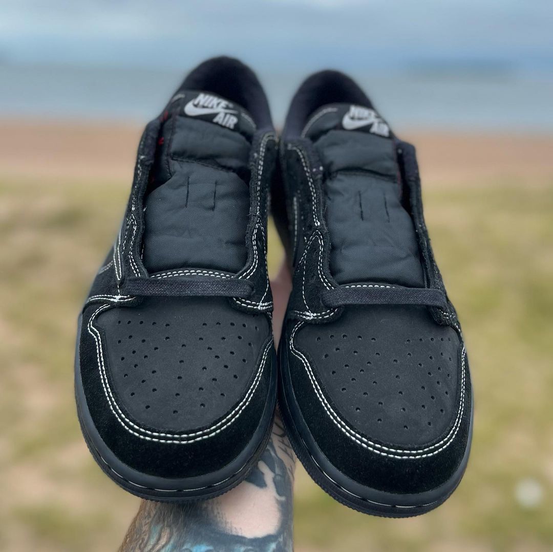 Jordan 1 Low OG Travis Scott Sneakers in Black DM7866-001 - product image from the listing.