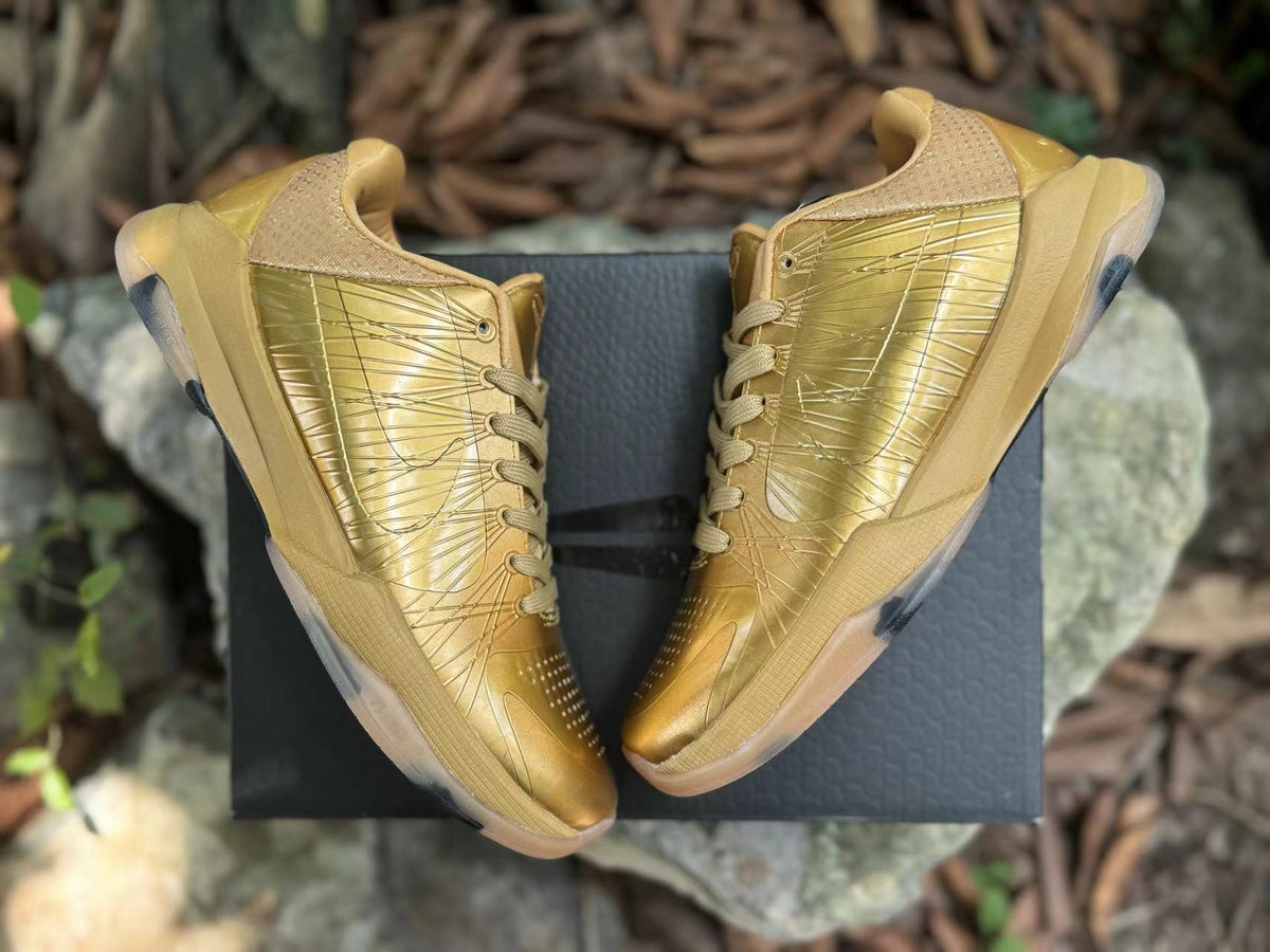 Metallic Gold Nike Kobe 5 Basketball Shoes - product image from the listing.
