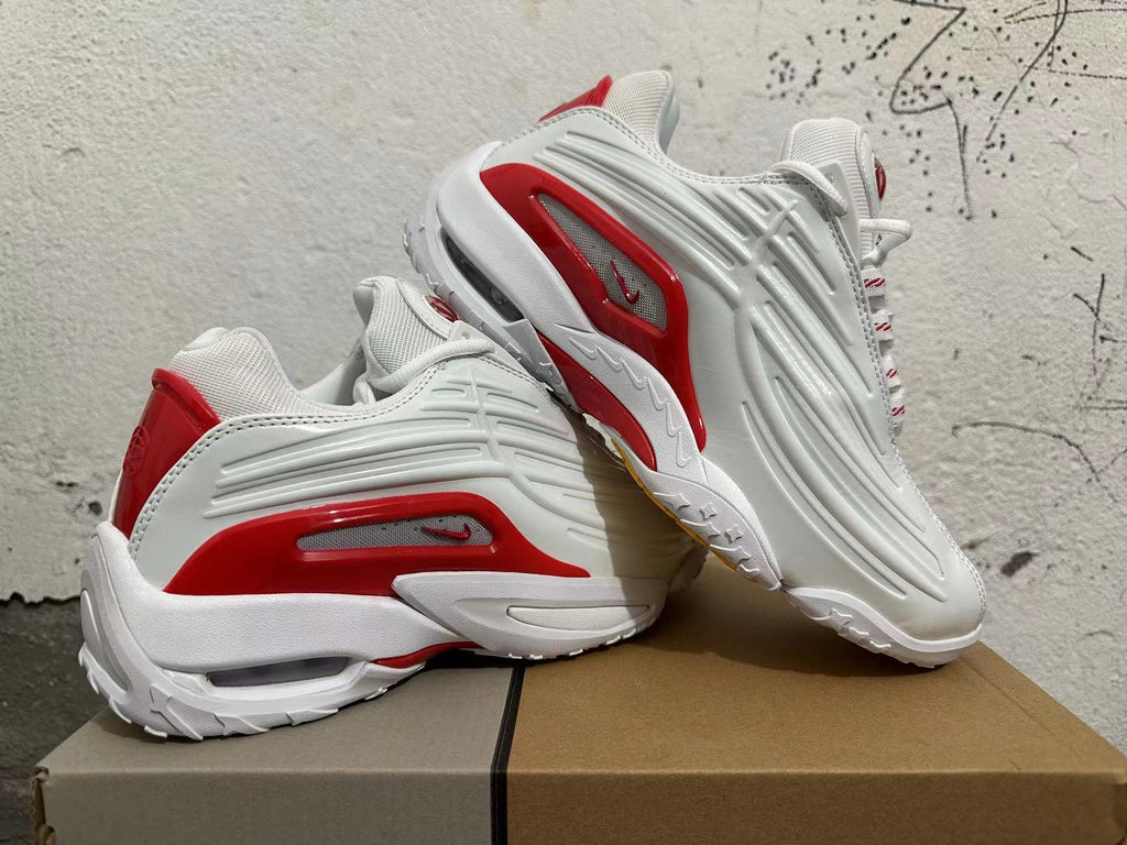 White and Red Athletic Trainers - product image from the listing.