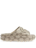 Interlocking G slide sandals by Gucci - product image from the listing.