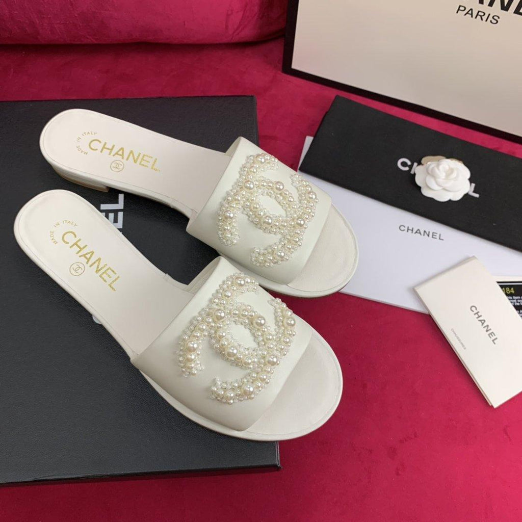 Sandals by Chanel - product photo shown in the listing for this item.