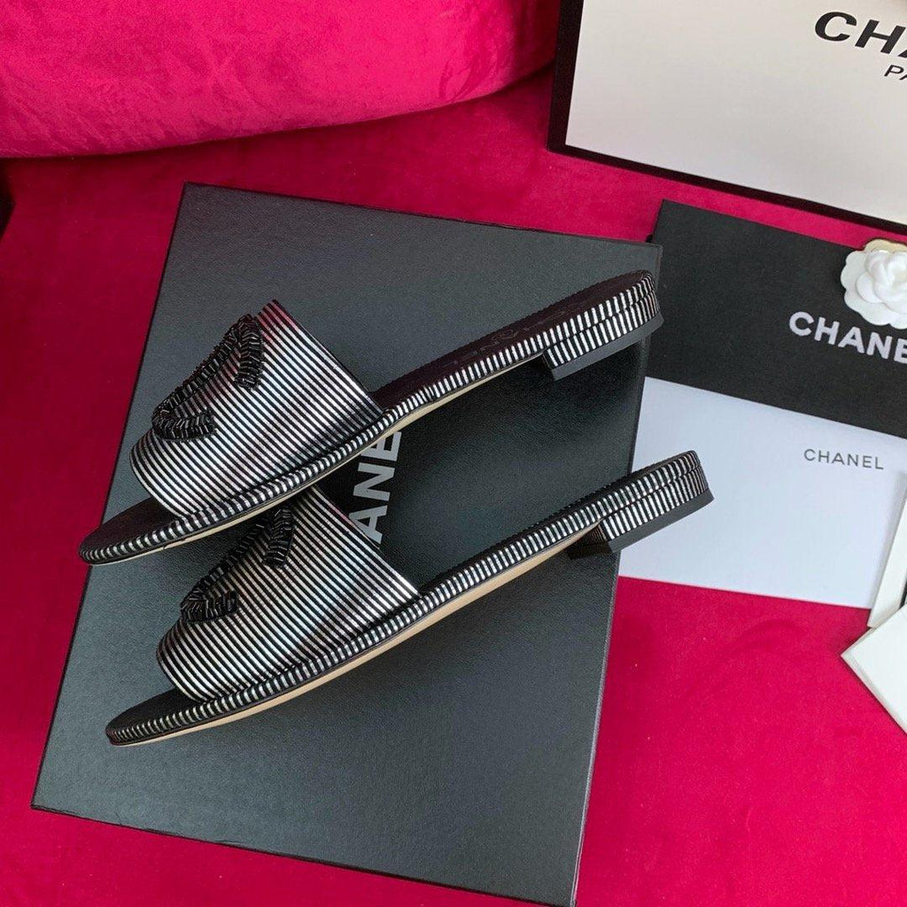 Sandals by Chanel - product photo shown in the listing for this item.