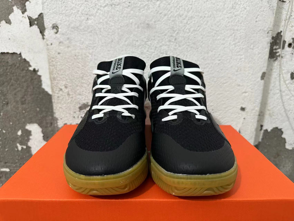 Nike Black and White Gum Sole Trainers - product image from the listing.