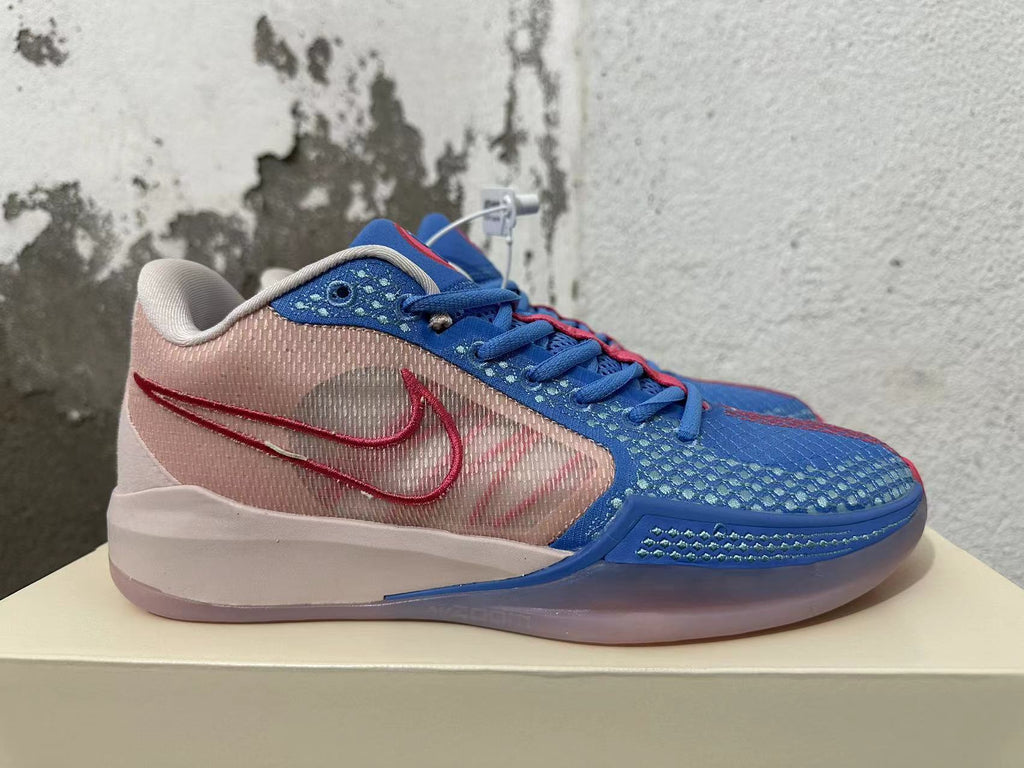 Nike Kobe 5 Protro Basketball Shoes in Blue and Pink - product image from the listing.