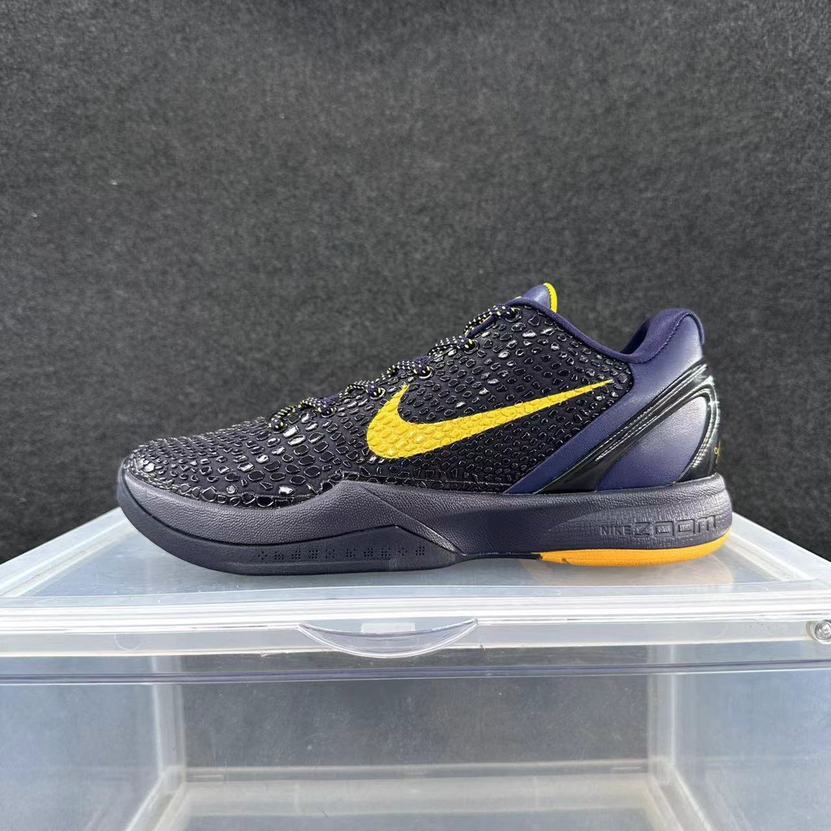 Nike Zoom Kobe 6 Basketball Shoes, in Navy and Yellow - product image from the listing.