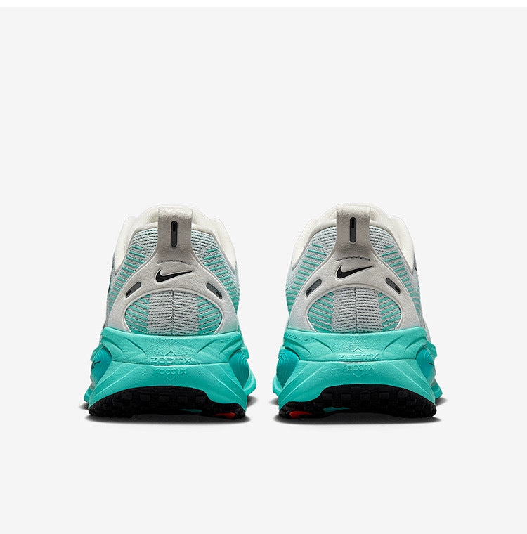 Nike Vomero 18 Running Shoes in White Aqua HM6803-103 - product image from the listing.