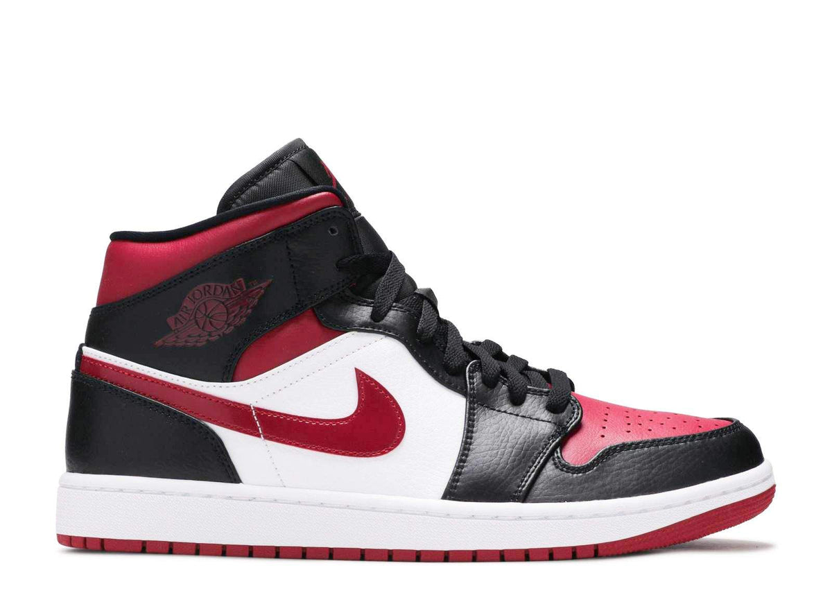Air Jordan 1 Mid 'Noble Red' Footwear - product image from the listing.