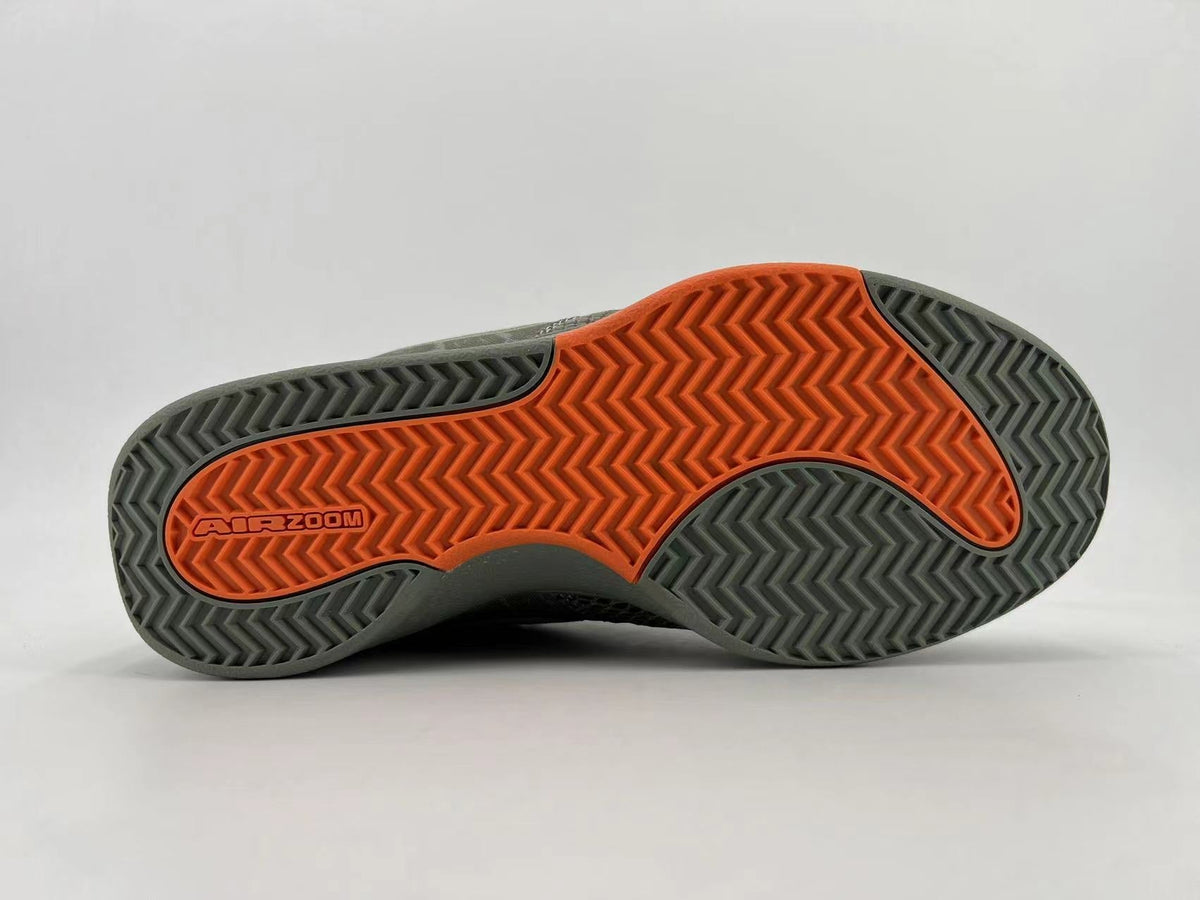 Gray and Orange Nike HF6236-002 Low-Top Sneakers - product image from the listing.