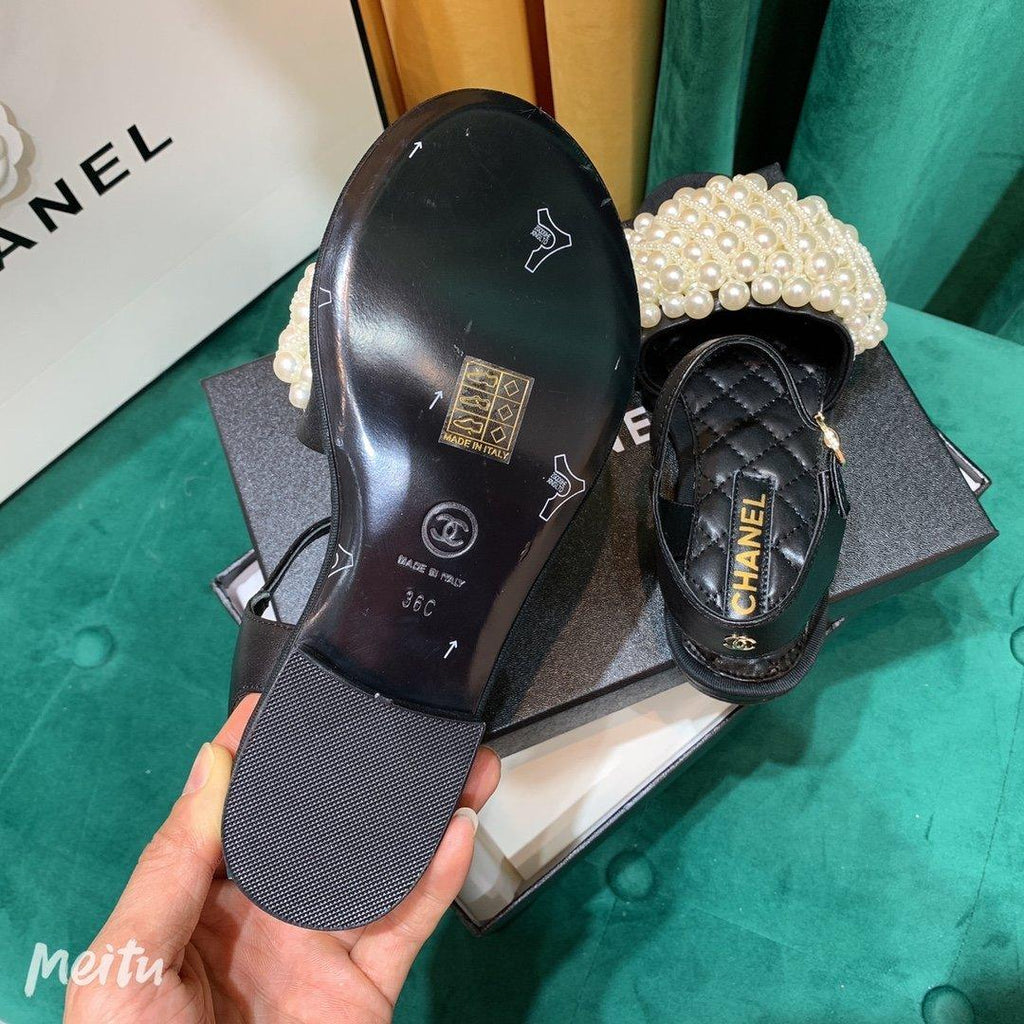 Sandals by Chanel - product photo shown in the listing for this item.