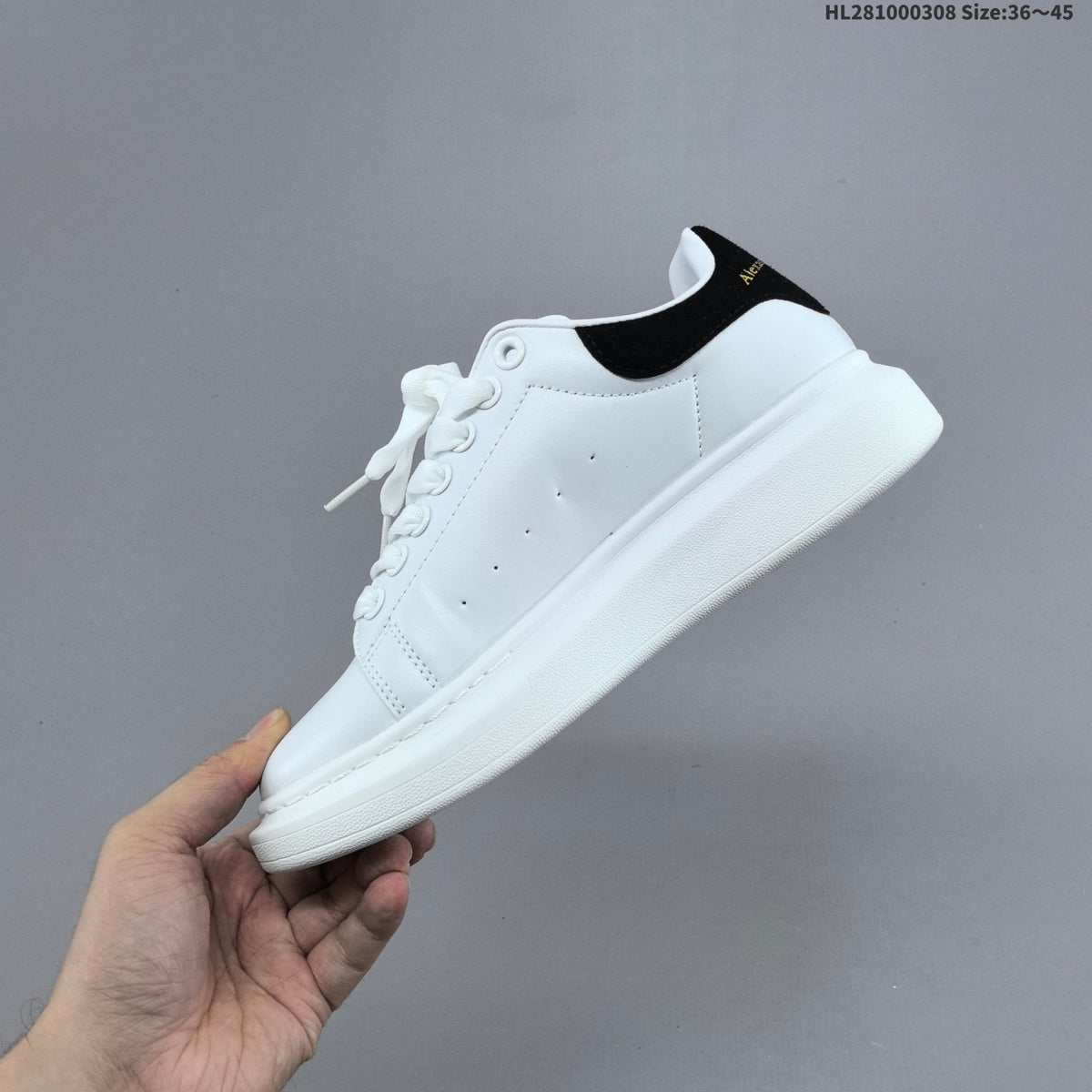 Alexander McQueen Oversized Low-Top Sneakers, in White and Black HL281000308 - product image from the listing.