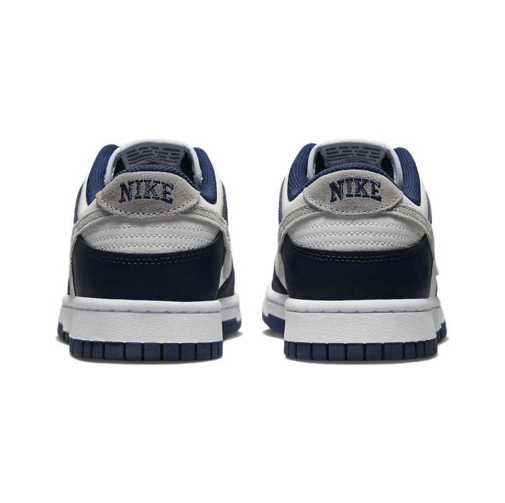 Nike Dunk Low Sneakers in Midnight Navy FD9749-400 - product image from the listing.