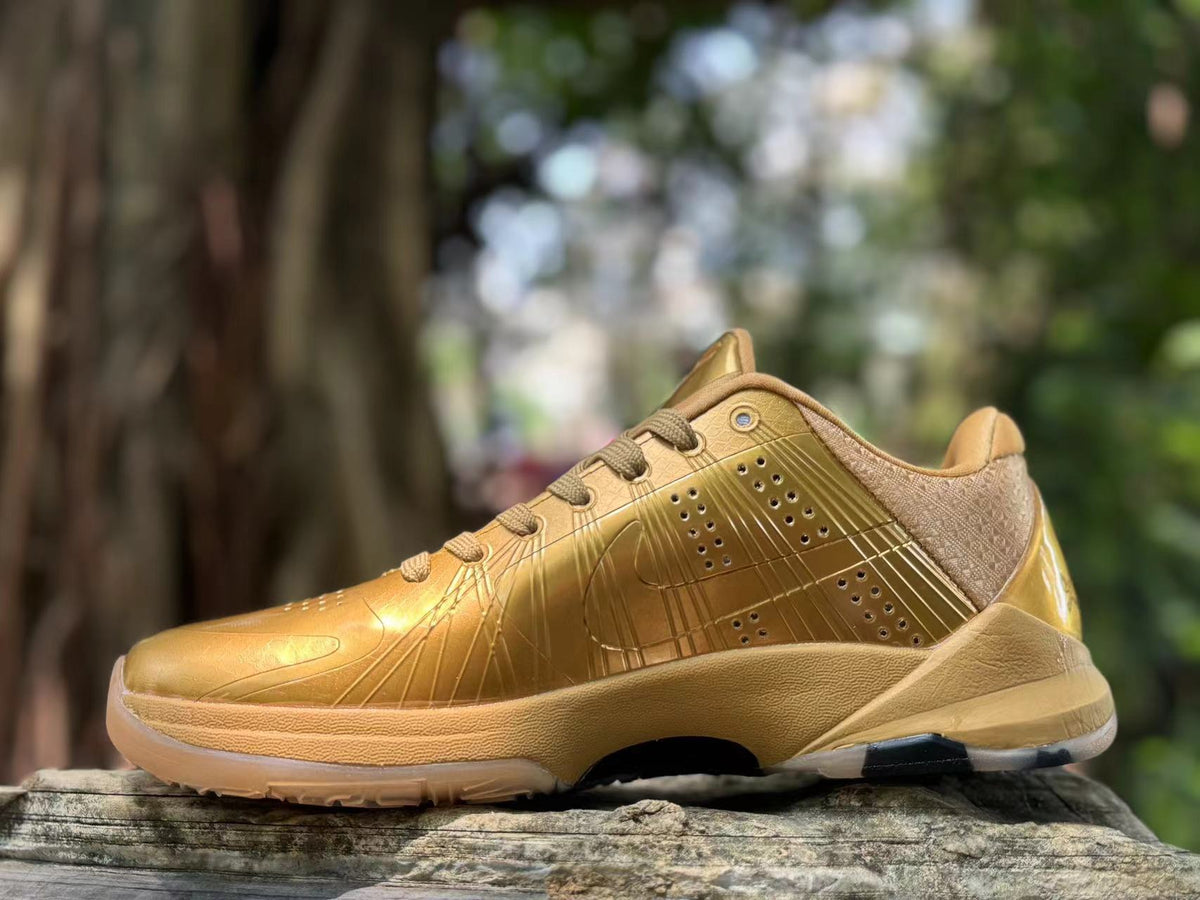 Metallic Gold Nike Kobe 5 Basketball Shoes - product image from the listing.