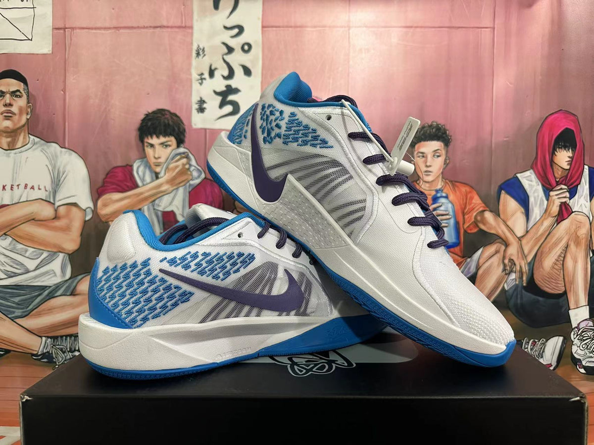 Nike Basketball Shoes in White and Blue - product image from the listing.