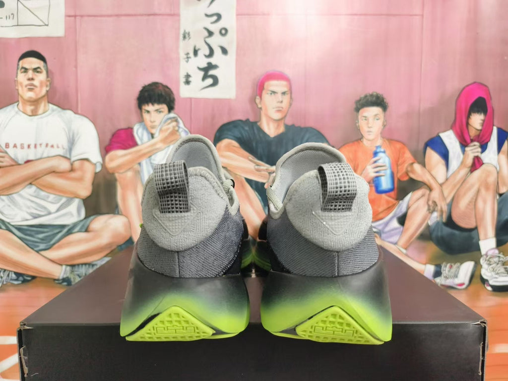 Gray and Volt Green Nike Basketball Shoes - product image from the listing.