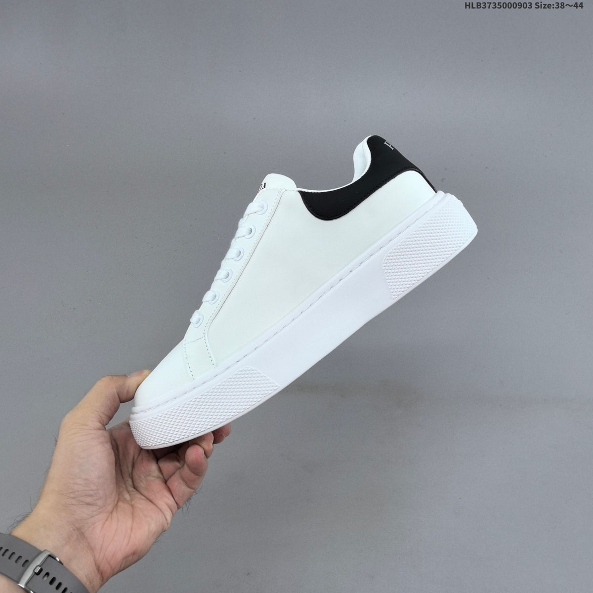 Prada Cloudbust Thunder Low-Top Sneakers, in White and Black - product image from the listing.