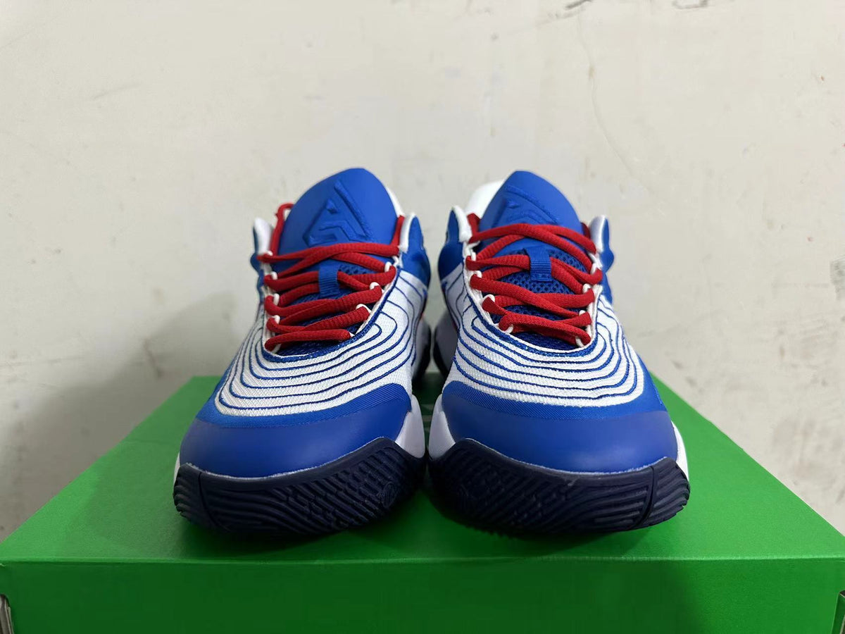 Nike Basketball Shoes in White Blue Red - product image from the listing.