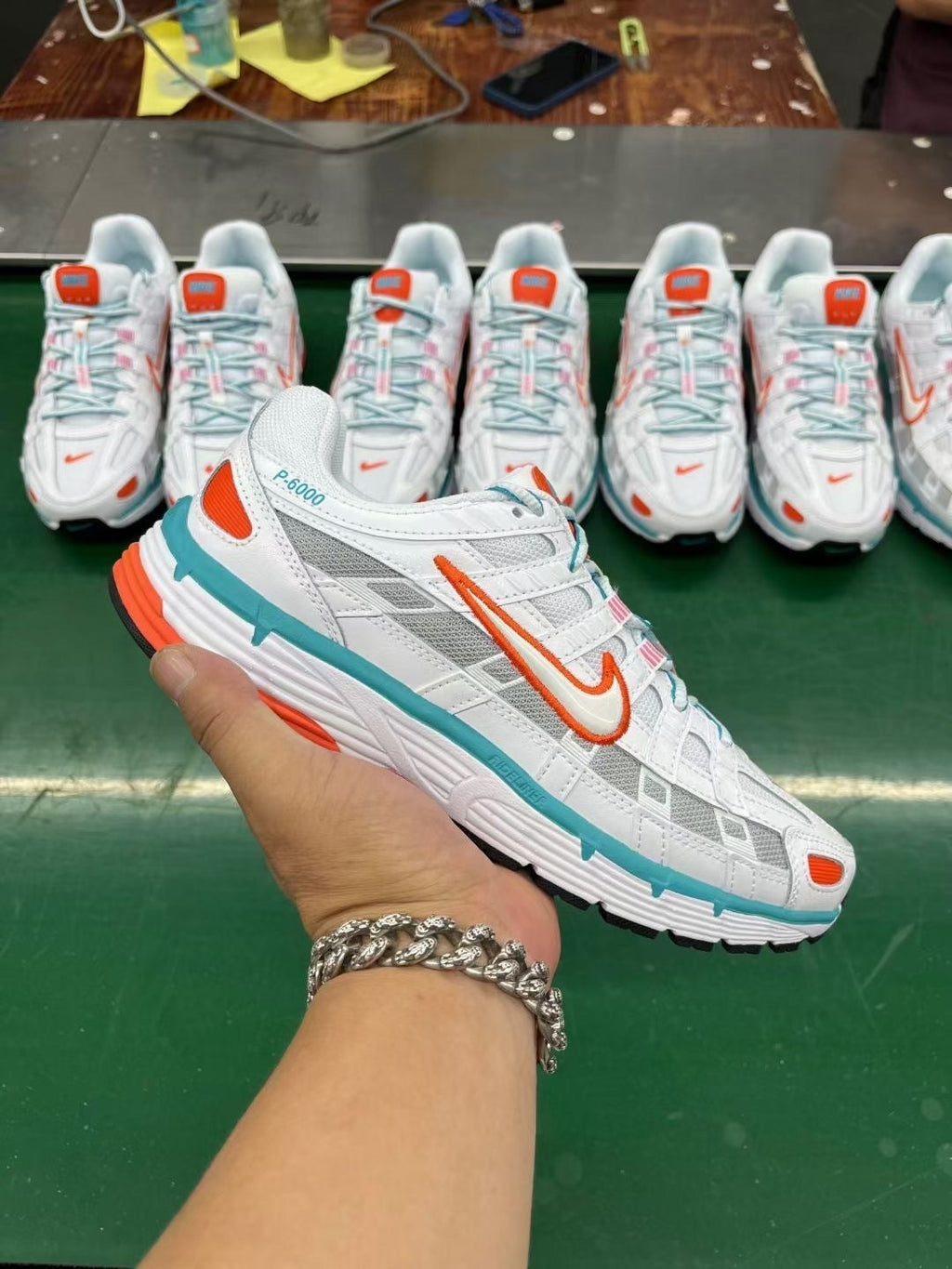 Nike P-6000 Sneakers in White Orange Teal - product image from the listing.