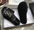 Chanel quilted slides in Black - product image from the listing.