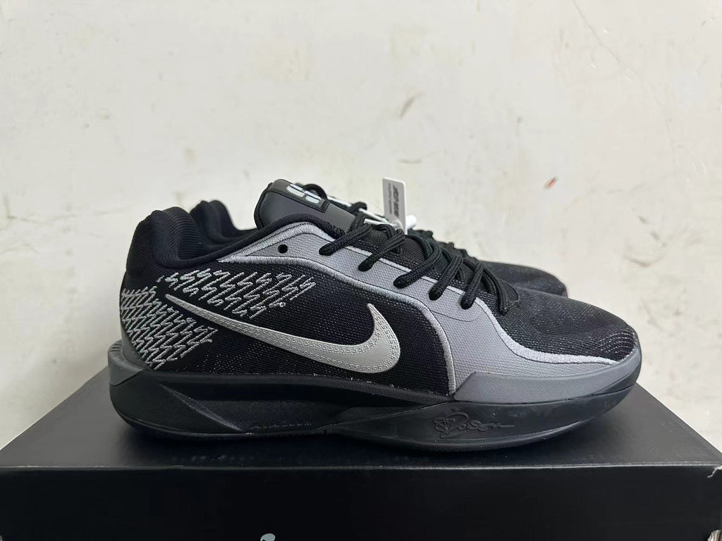 Nike Kobe 5 Basketball Shoes in Black and Grey - product image from the listing.