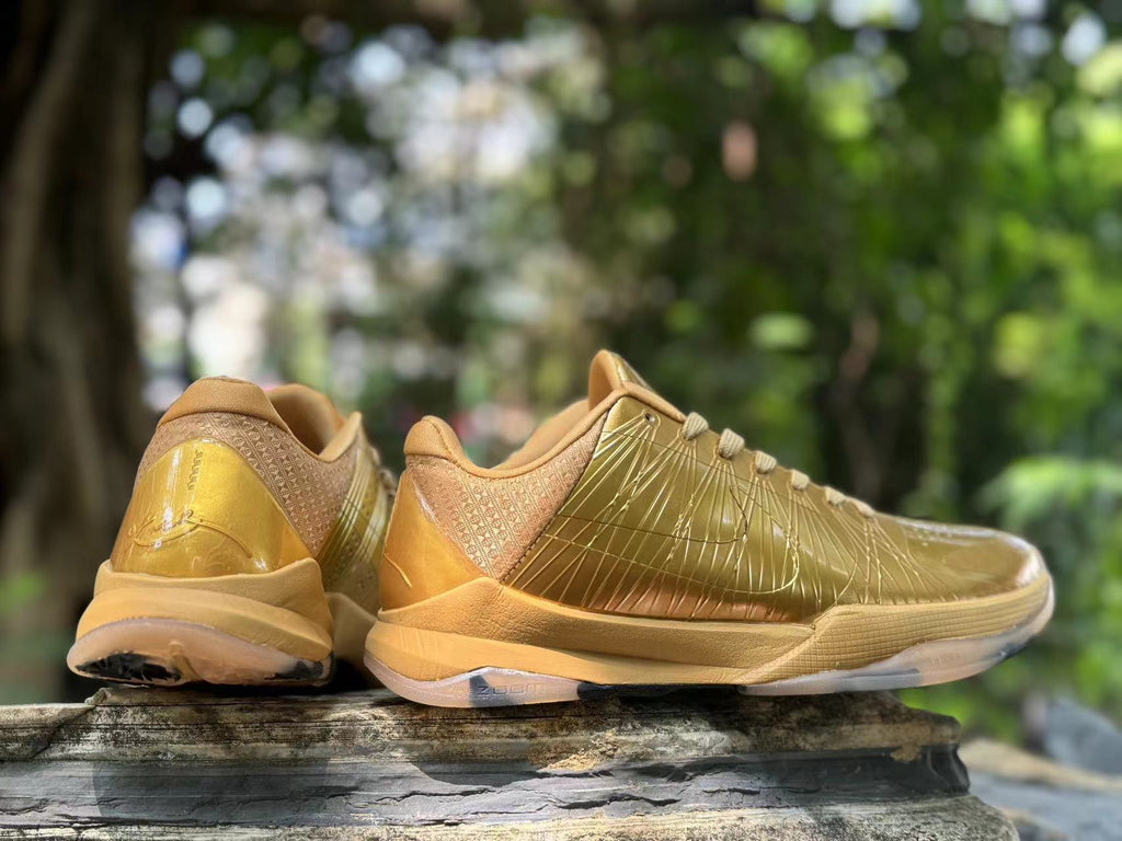 Metallic Gold Nike Kobe 5 Basketball Shoes - product image from the listing.