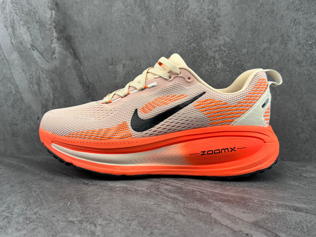 Beige and Orange Nike ZoomX Running Shoes - product image from the listing.