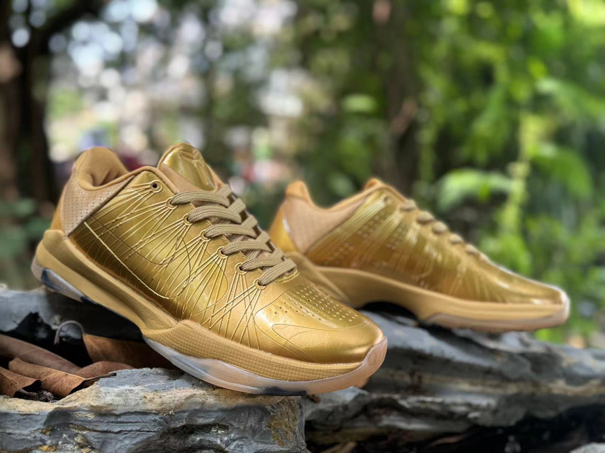 Metallic Gold Nike Kobe 5 Basketball Shoes - product image from the listing.