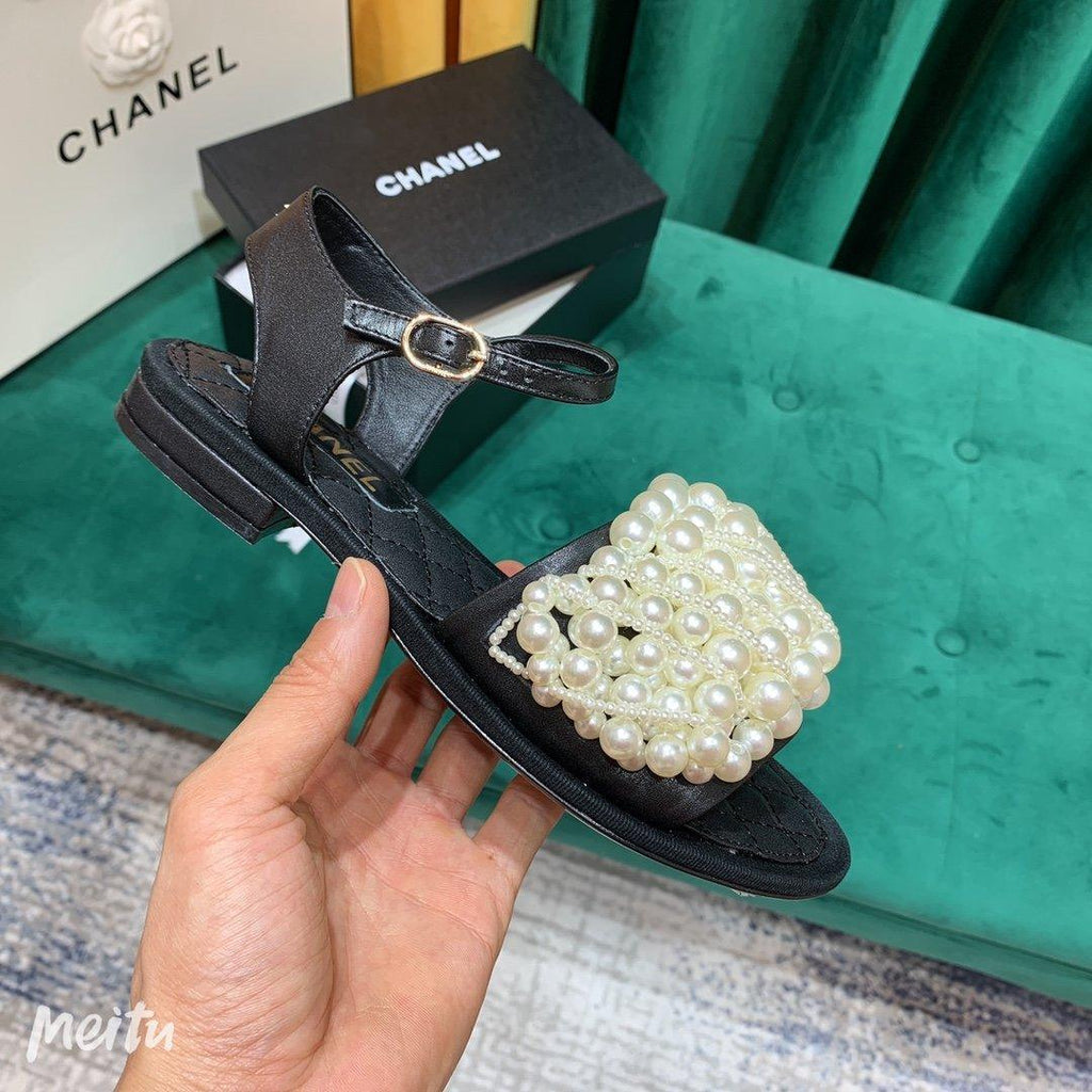 Sandals by Chanel - product photo shown in the listing for this item.