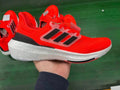 adidas Ultraboost 23 Running Shoes in Red Black HQ6341 - product image from the listing.