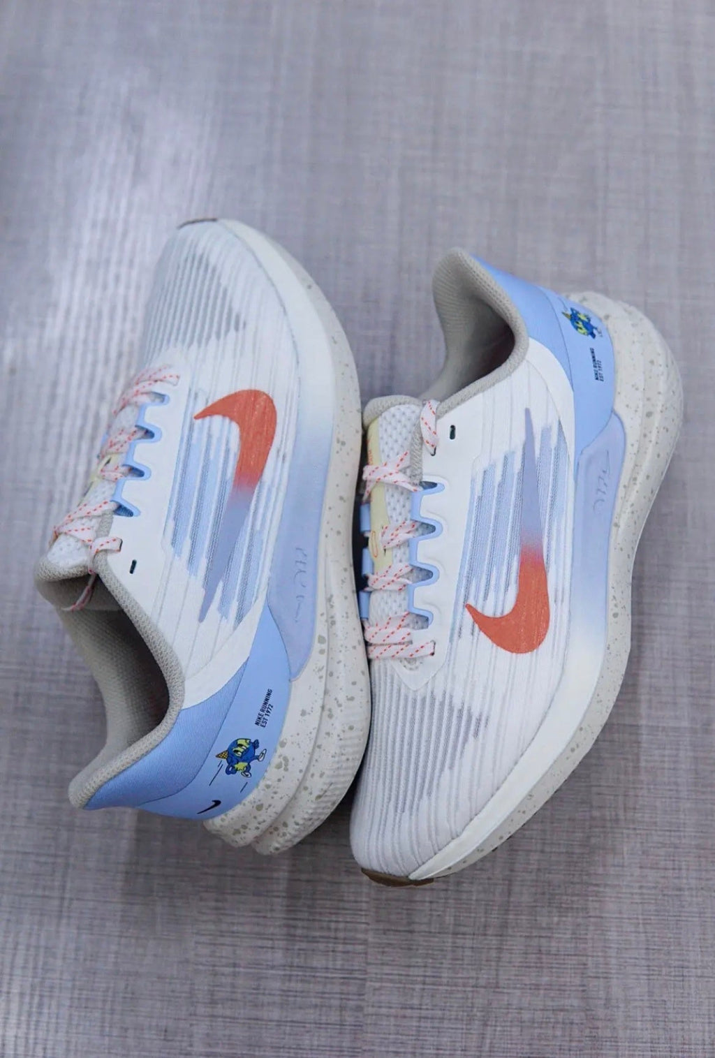White and Light Blue Nike Air Winflo 9 Running Shoes DX6048-181 - product image from the listing.