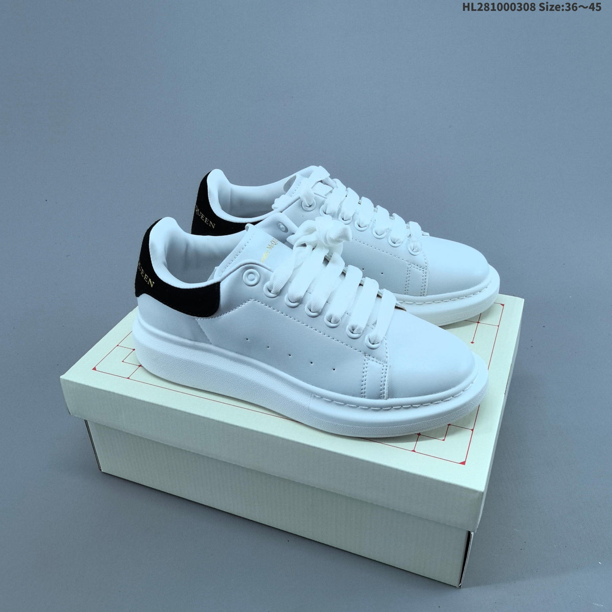 Alexander McQueen Oversized Low-Top Sneakers, in White and Black HL281000308 - product image from the listing.