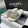 Sandals by Chanel - product photo shown in the listing for this item.