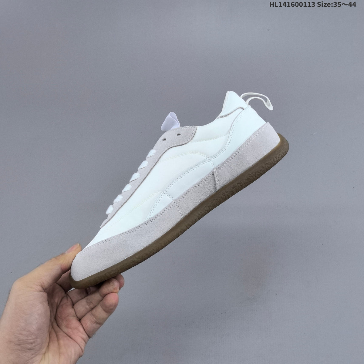 Miu Miu Tyre Low-Top Sneakers in Black or in White - product image from the listing.