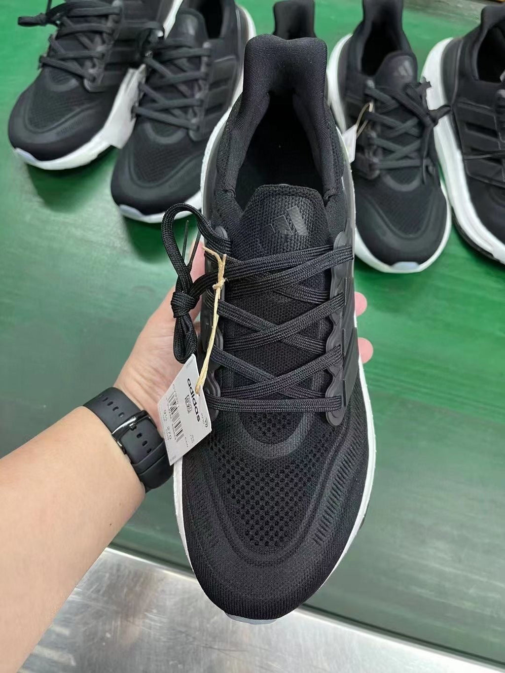 adidas Ultraboost 23 Light Running Shoes in Black White GY9351 - product image from the listing.