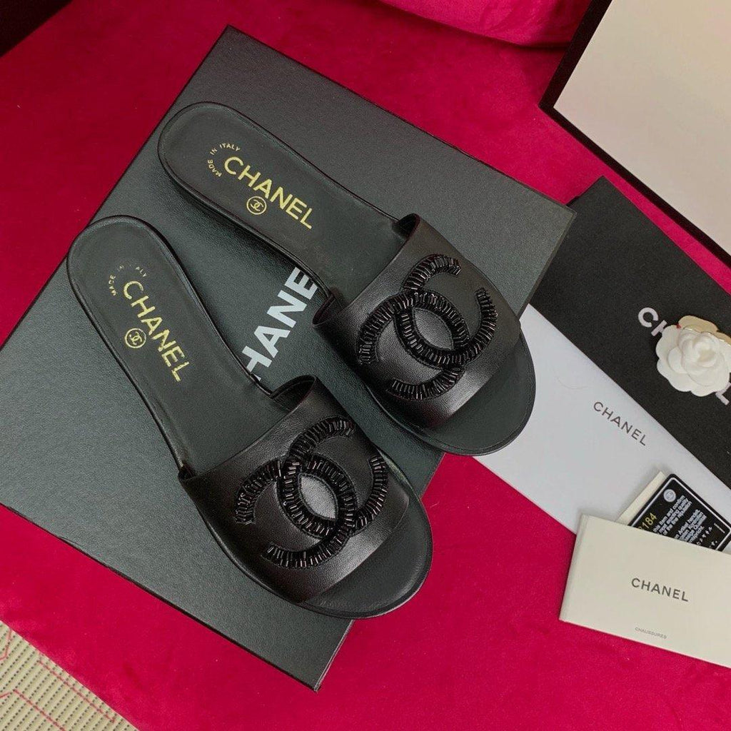 Sandals by Chanel - product photo shown in the listing for this item.