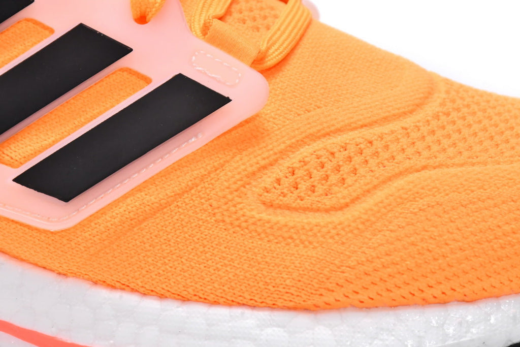 Adidas Ultra Boost 22 Running Shoes in Orange HR1029 - product image from the listing.
