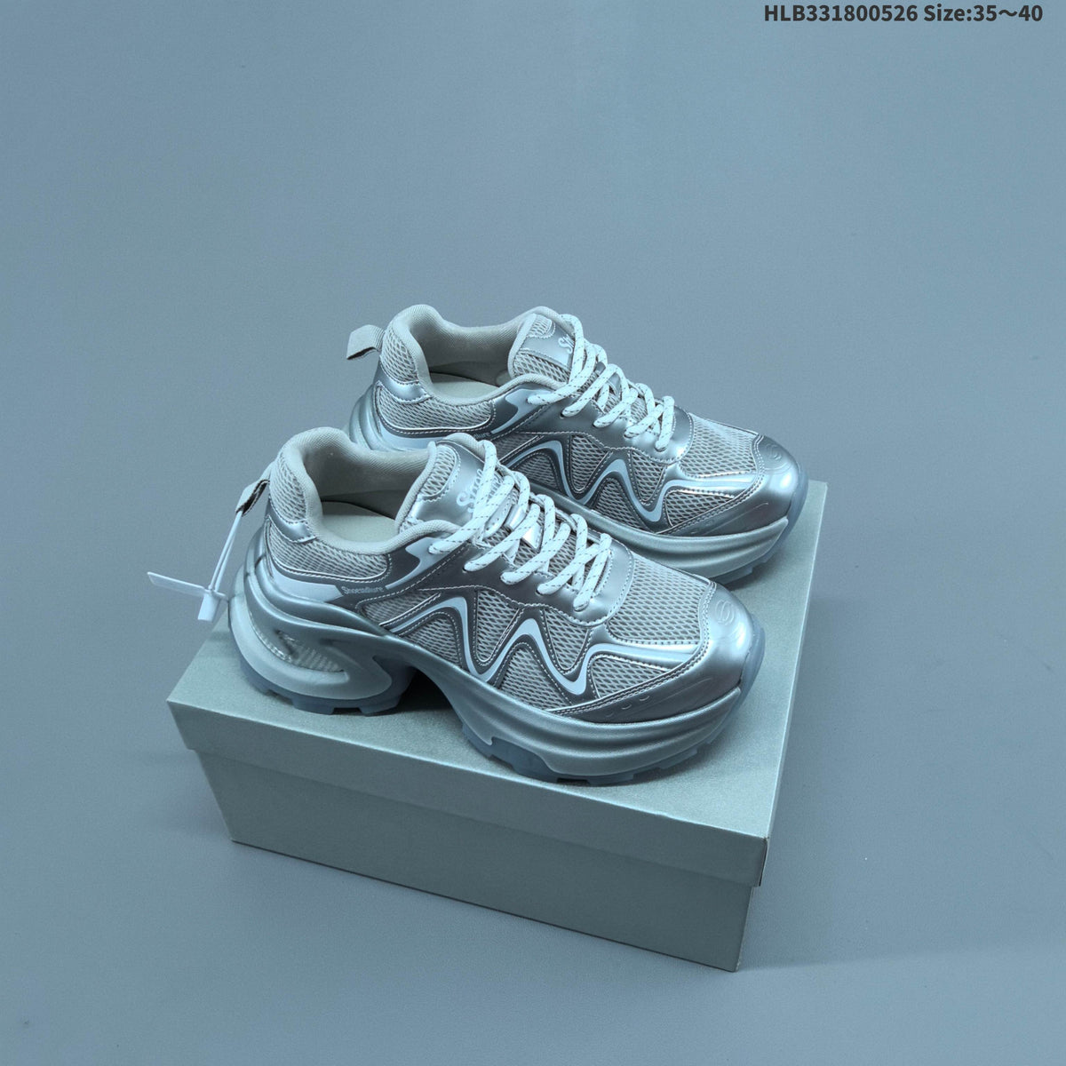 Silver and White GG-CC Chunky Low-Top Sneakers - product image from the listing.