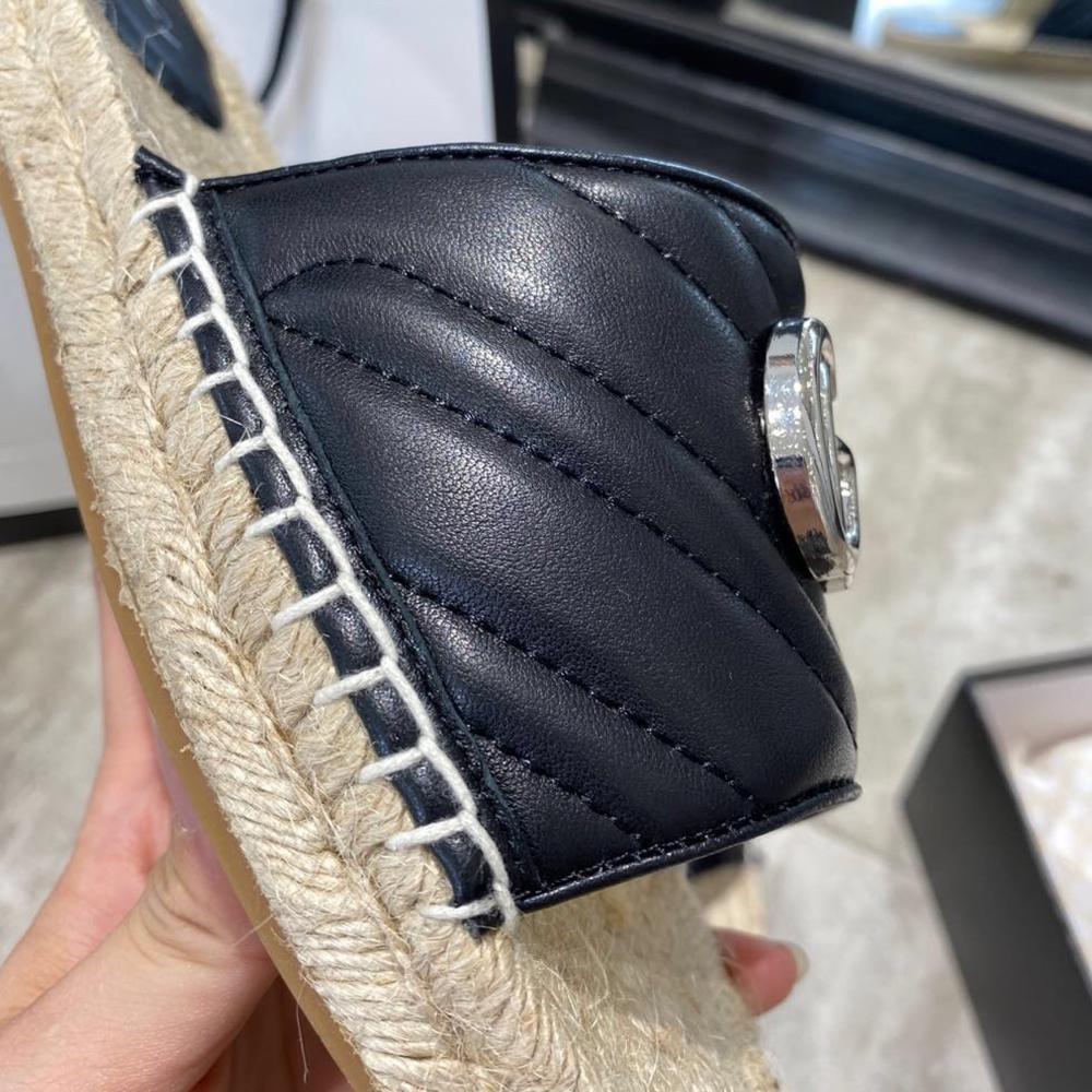quilted leather slide sandals by Gucci - product image from the listing.