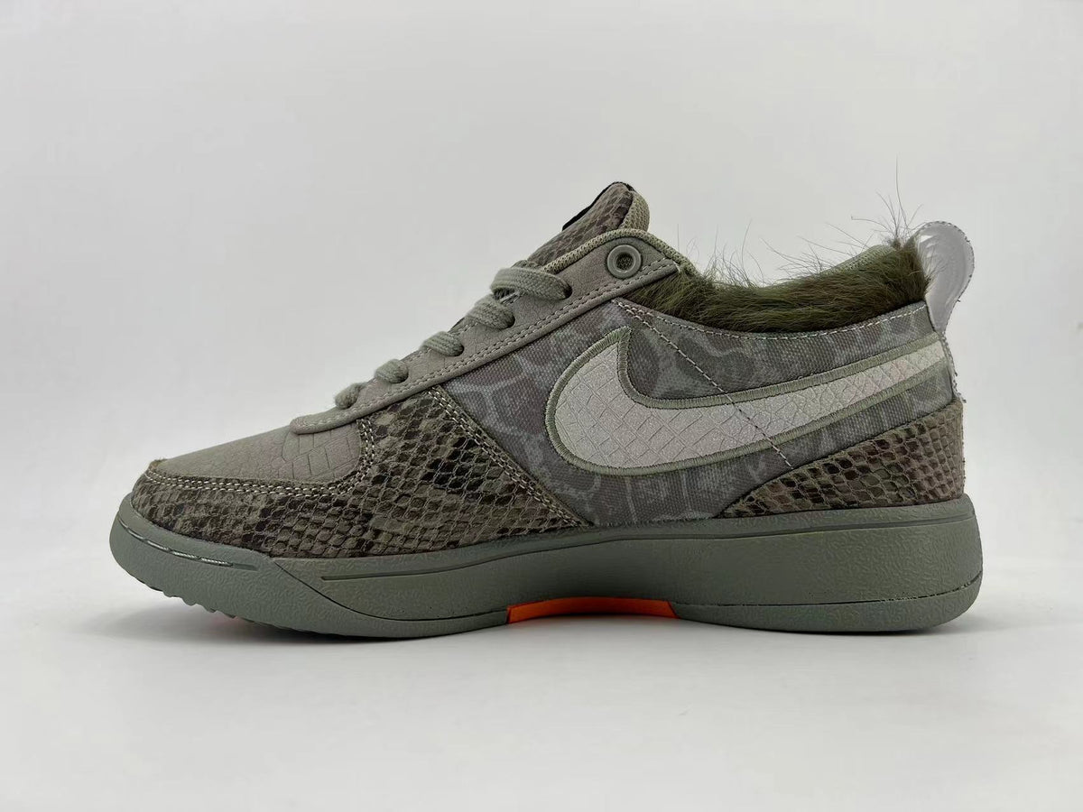 Gray and Orange Nike HF6236-002 Low-Top Sneakers - product image from the listing.