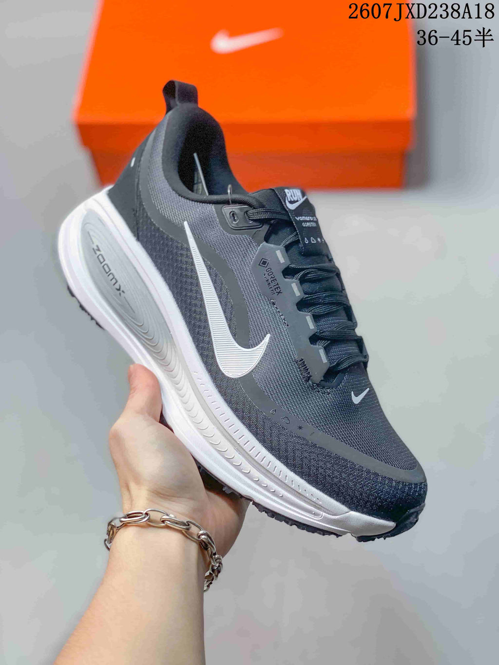 Nike Vomero 18 GTX Running Shoes in Dark Gray White - product image from the listing.