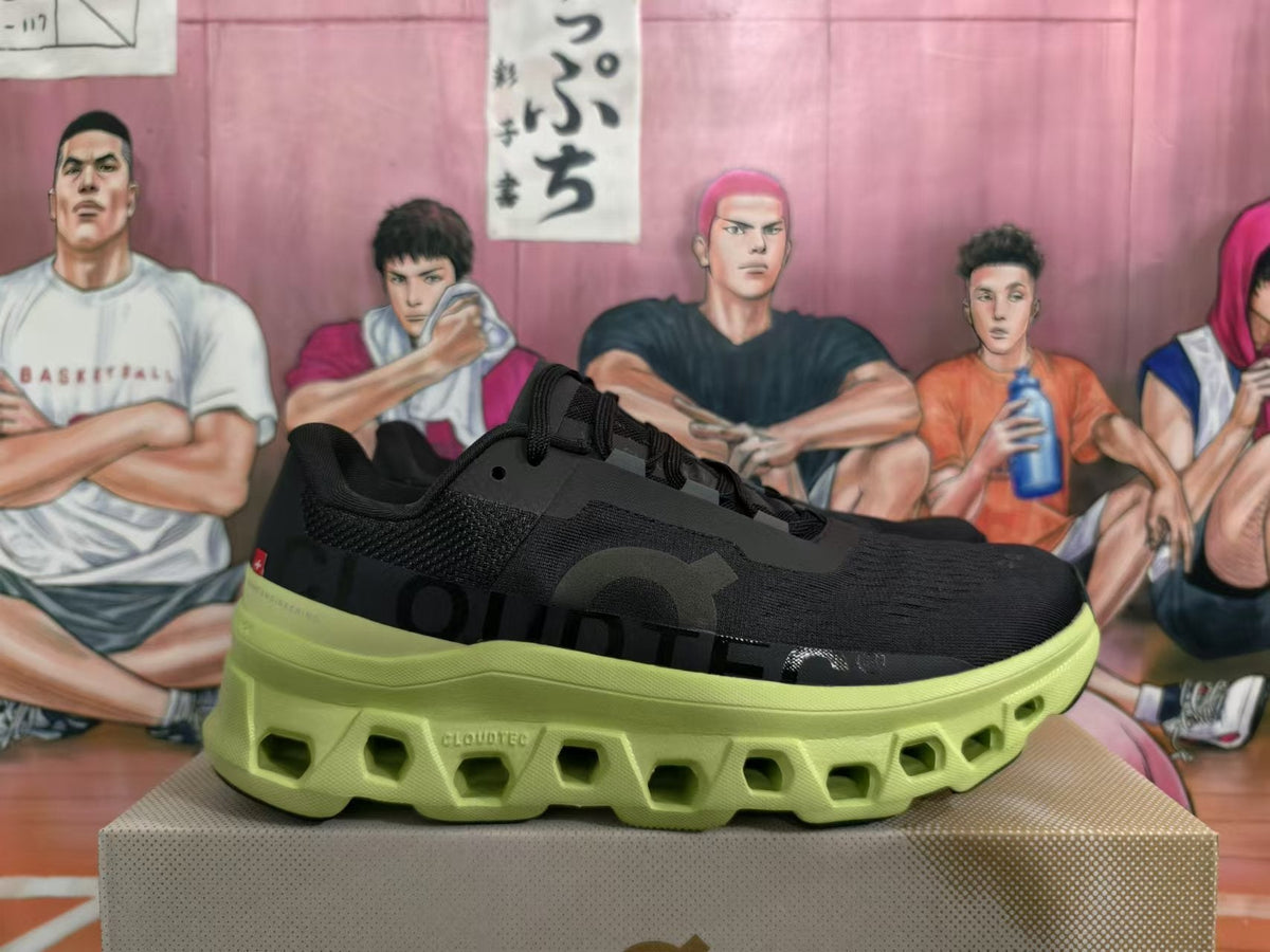 On Running Cloudmonster Sneakers in Black and Lime Green - product image from the listing.